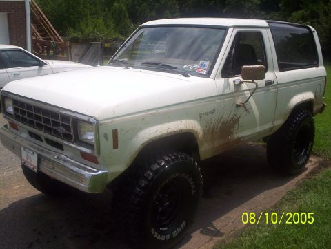 1984 Ford Bronco II - This 1984 Ford Bronco II has seen some off-road action, evident by the mud splatters.