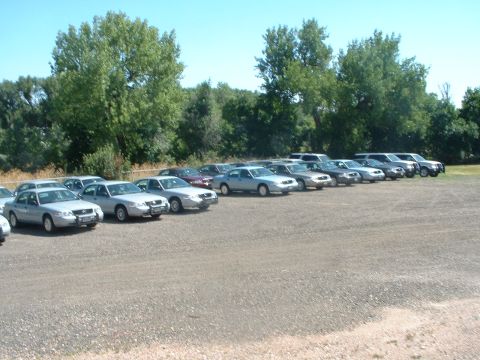 1999 Ford Crown Victoria - 2005 Crown Vics waiting to be outfitted for duty.