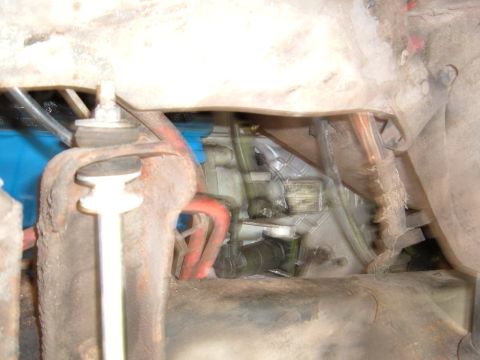 1978 Ford Bronco - This image shows a close-up view of the engine bay, focusing on the transmission and suspension components.