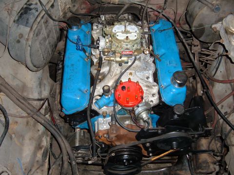 1978 Ford Bronco - Close-up view of an engine bay, showing the carburetor and valve covers.