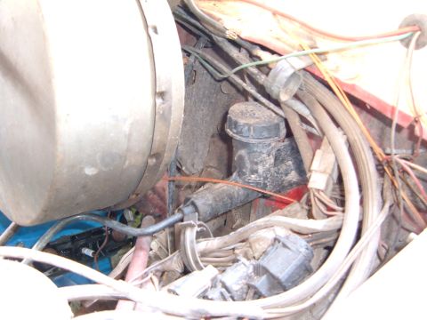 1978 Ford Bronco - Close-up of brake fluid reservoir and master cylinder assembly with associated wiring.