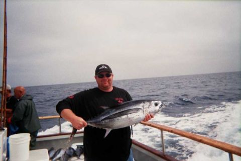 1985 Ford Bronco - A successful fishing trip at sea with a large catch.