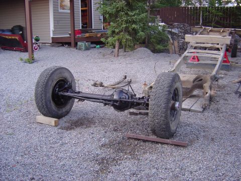 1986 Ford F-150 - Chassis and rear axle assembly of a truck, possibly undergoing restoration or repair.