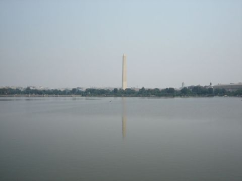 1986 Ford Bronco - The Washington Monument stands tall, its reflection mirrored in the calm waters of the Potomac River.