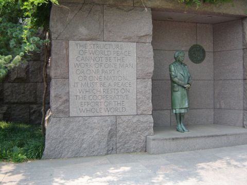 1986 Ford Bronco - A statue of Eleanor Roosevelt stands beside a stone monument inscribed with a quote about peace.