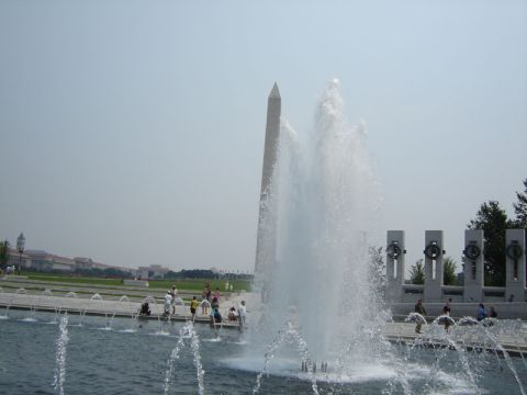 1986 Ford Bronco - A view of the Washington Monument and WWII Memorial with fountains active and people enjoying the area.