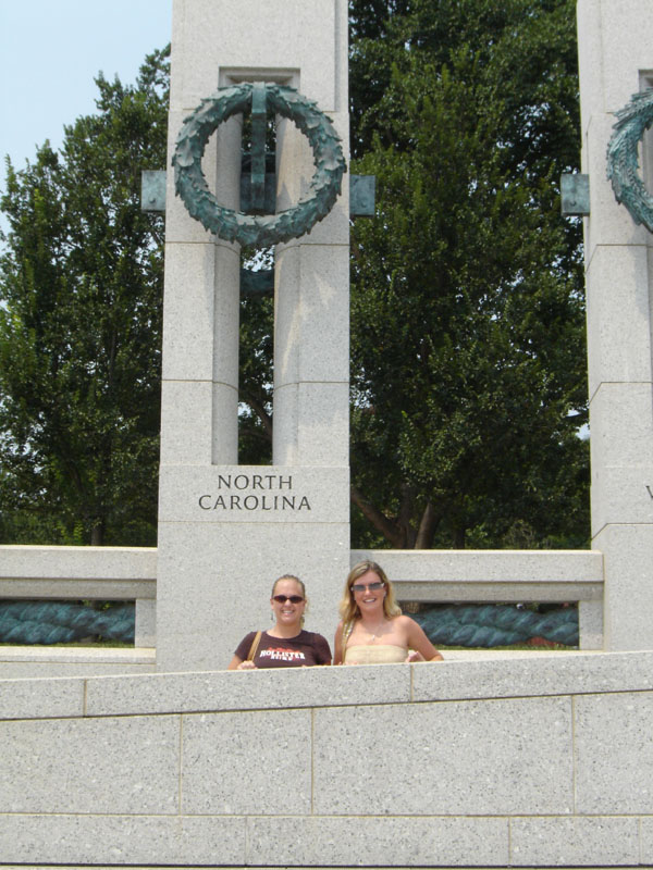 World War II Memorial with two people and "NORTH CAROLINA" inscription