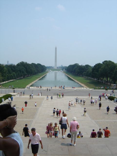 1986 Ford Bronco - A view of the Washington Monument and Reflecting Pool from the steps of the Lincoln Memorial, with many tourists present.