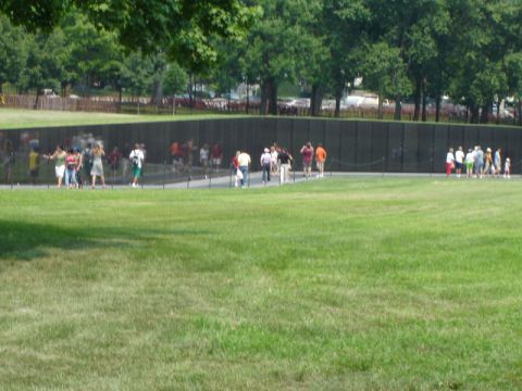 1986 Ford Bronco - People visit the Vietnam Veterans Memorial wall in Washington D.C. on a bright, sunny day.