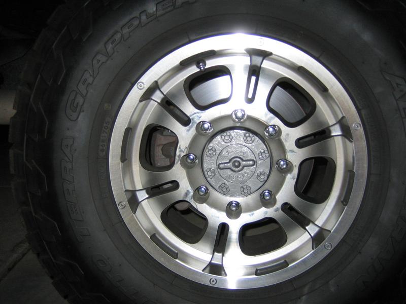Machined 8-lug alloy wheel with locking hub on a Nitto Terra Grappler tire