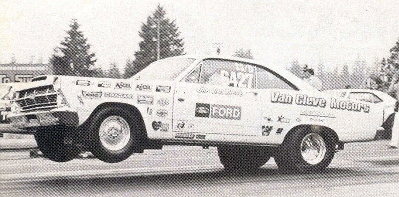Vintage Ford drag car doing a wheelstand at a strip, lettered Van Cleve Motors