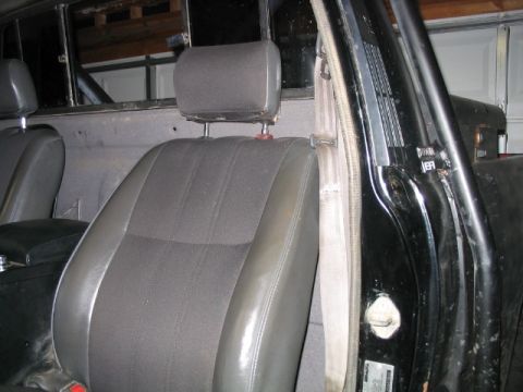1986 Ford F-150 - Interior view of a 1986 Ford F-150, focusing on the seats and door.