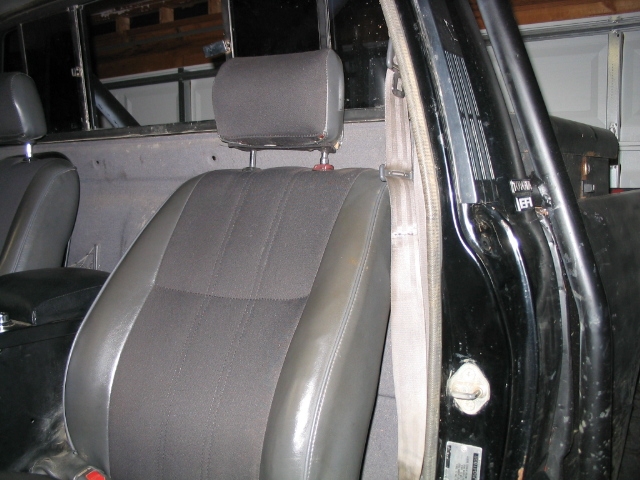 1986 Ford F-150 interior showing front seats and door frame