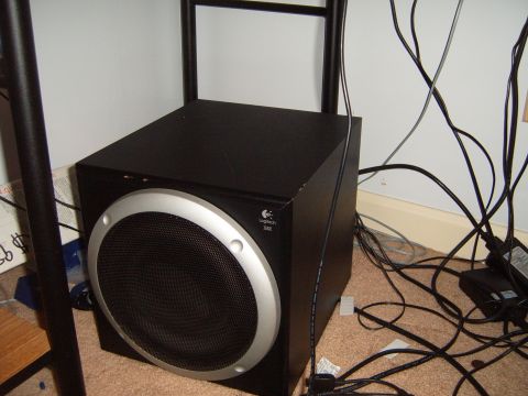 1988 Ford Bronco - A Logitech 301 subwoofer is shown with tangled cables in the background.