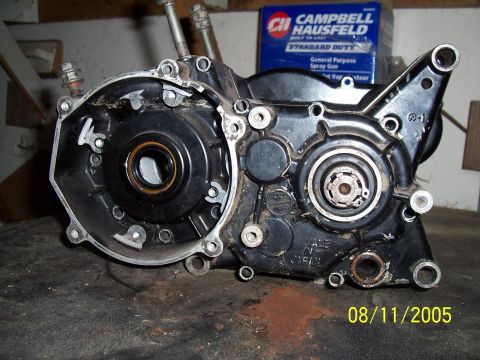1987 Ford Bronco - A close-up view of a motorcycle engine case, showing internal components and a date stamp of 08/11/2005.