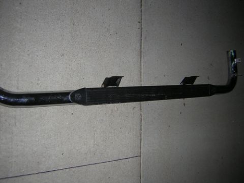 1995 Ford Bronco - Exhaust pipe with mounting brackets shown against a concrete background.