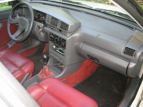 1989 Peugeot 405 - Interior view of a car, showing the dashboard, steering wheel, and seats.