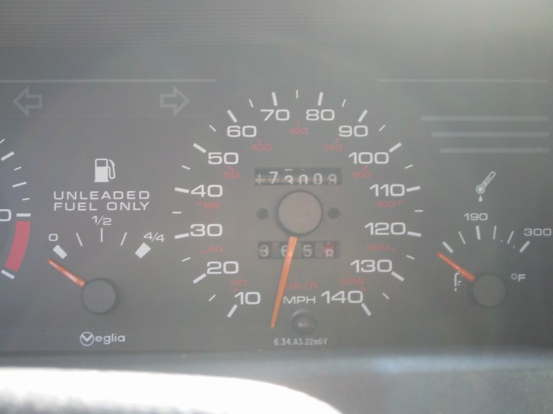 Car instrument cluster with MPH speedometer, fuel and temperature gauges, Veglia branding.