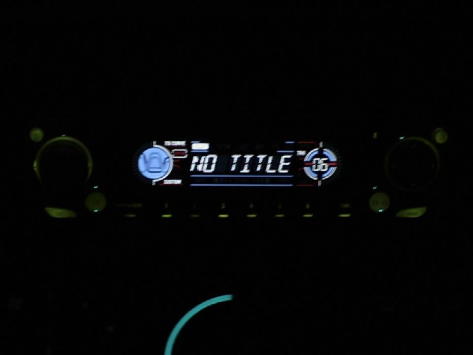 Car stereo display showing 'NO TITLE' and '06'