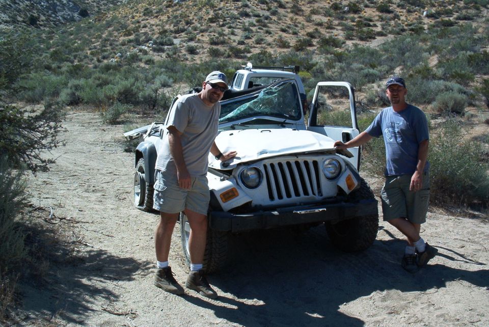 Here's my buds that helped bring it down.  John on the right drove it down the sandy steep trail backwards with both rear tires flat, open and in 2wd.  Damn'd linkage seemed to been toast.