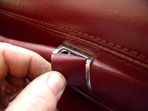 1990 Lincoln Town Car - Pop the door pull handle trim covers off with a "right small" screwdriver and stash em' where you won't step on them.