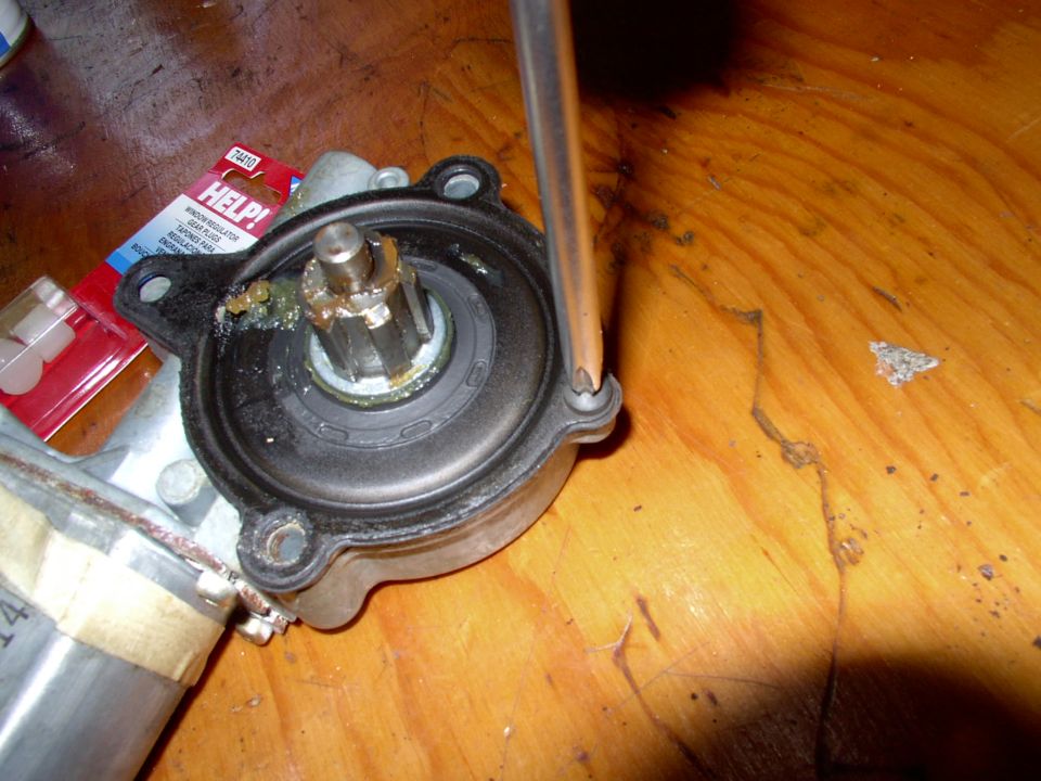 Out comes one philips screw