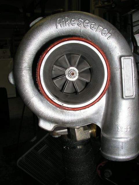 1996 Ford Probe - Close-up of an AiResearch turbocharger, showing internal components and branding.