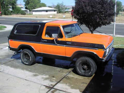 1979 Ford Bronco - This two-tone Ford Bronco is parked outside on a sunny day.