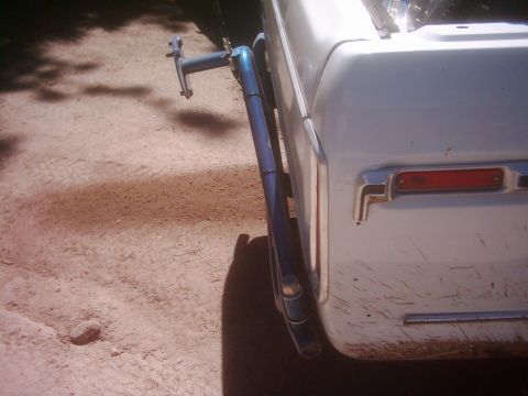 1978 Ford Bronco - Rear view of a 1978 Ford Bronco showing the quarter panel and an external spare tire carrier.