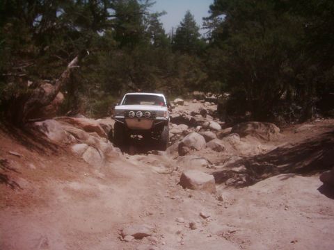 1978 Ford Bronco - This 1978 Ford Bronco is shown tackling a challenging, rocky terrain during an off-road excursion.