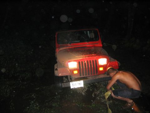 1994 Ford Bronco - Jeep stuck almost half way up the rear wheels. Only one side bad