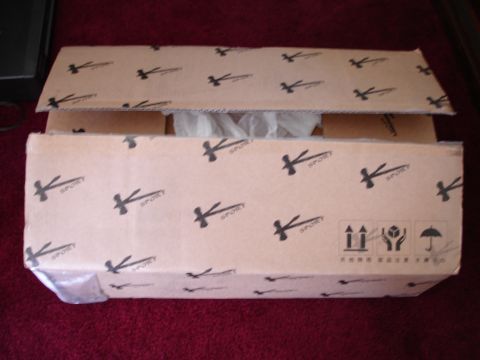 1989 Mazda MX-6 - Cardboard box with K SPORT logo and shipping symbols visible on the side.