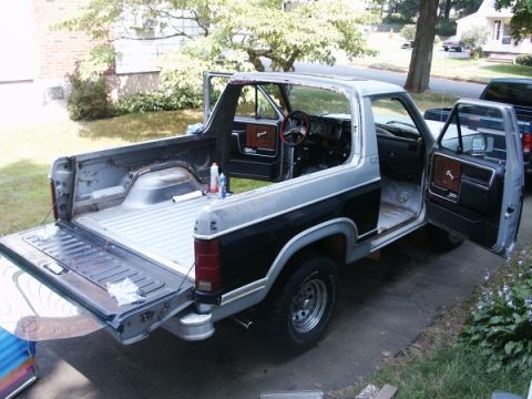 1982 Ford Bronco - This Ford Bronco appears to be undergoing some work, with its doors and tailgate open.