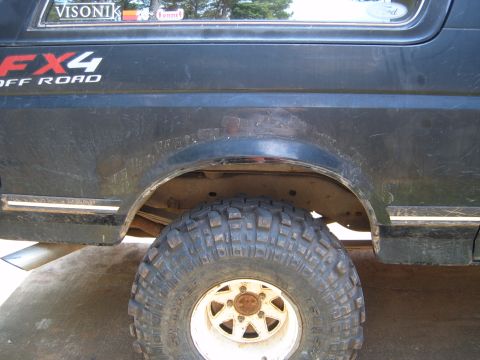 1988 Ford Bronco - Close-up of the rear fender trim and wheel on a 1988 Ford Bronco FX4.