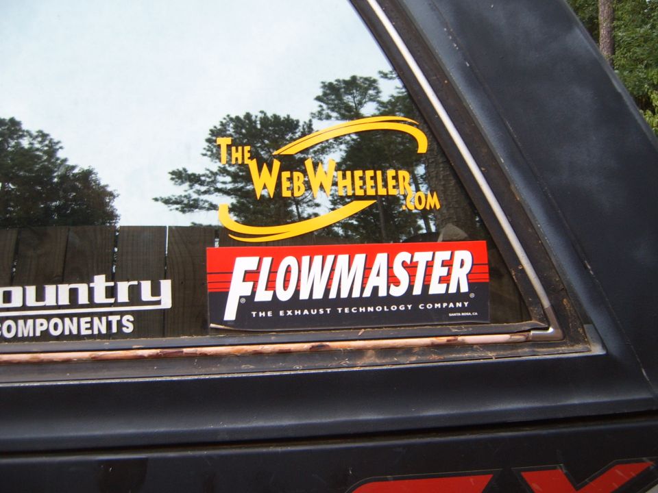 Side window with Flowmaster and The Web Wheeler stickers