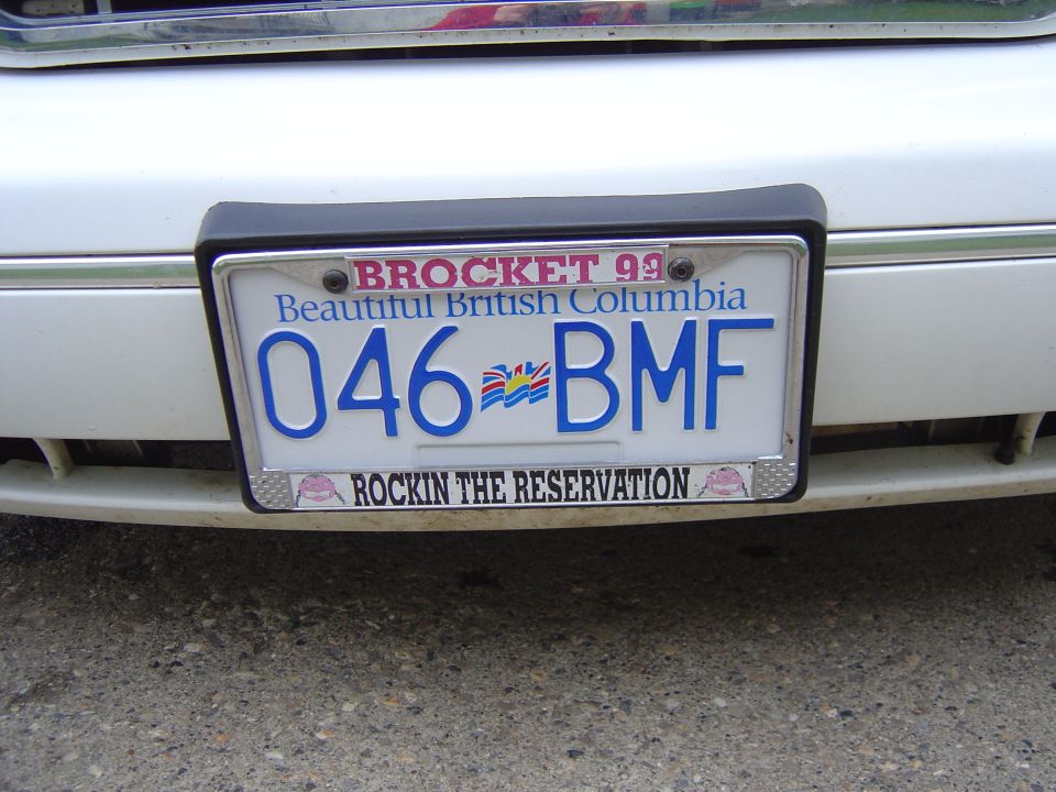 White car bumper with BC plate 046 BMF and 'Rockin the Reservation' frame.