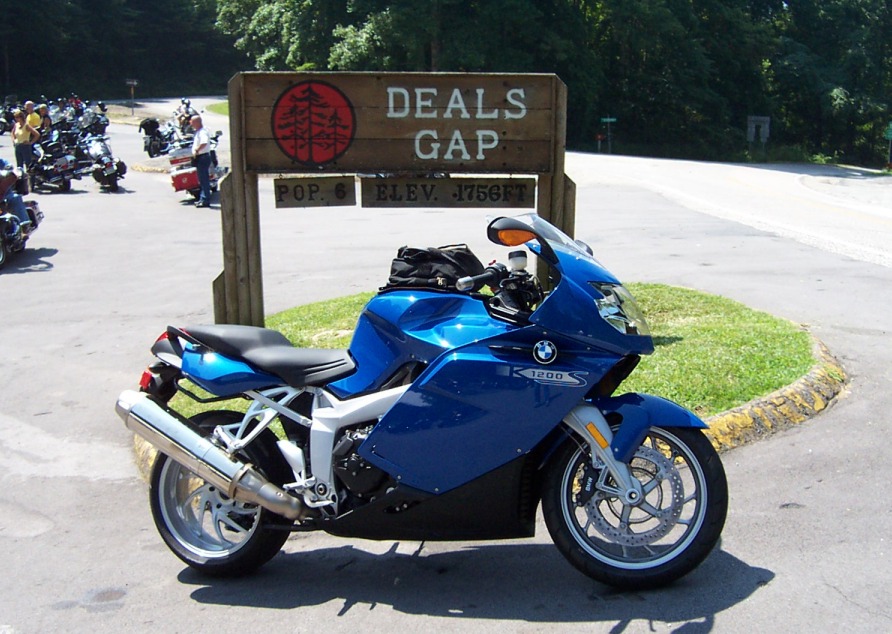 Blue 2005 BMW R1200CA ABS motorcycle parked at Deals Gap sign