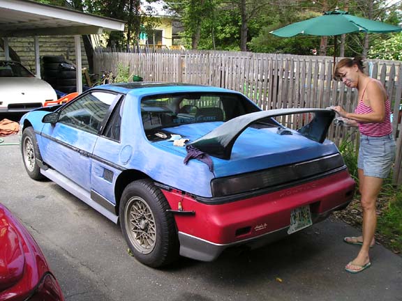 1984 Pontiac Fiero rear view, blue and red with spoiler