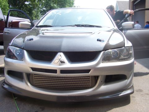 1990 Ford Probe - Front view of a silver Mitsubishi Lancer Evolution VIII, modified with an aftermarket intercooler and hood pins.