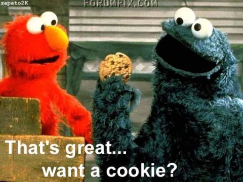1995 Ford Bronco - Elmo and Cookie Monster are having a conversation, with Cookie Monster offering Elmo a cookie.