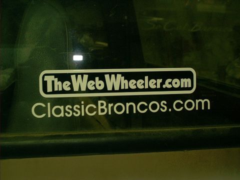 1990 Ford Bronco - Window sticker for ClassicBroncos.com and TheWebWheeler.com is visible.