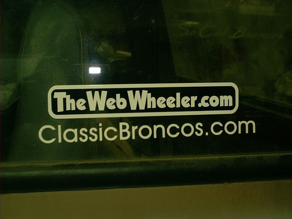 Sticker on a window reads 'TheWebWheeler.com' and 'ClassicBroncos.com'