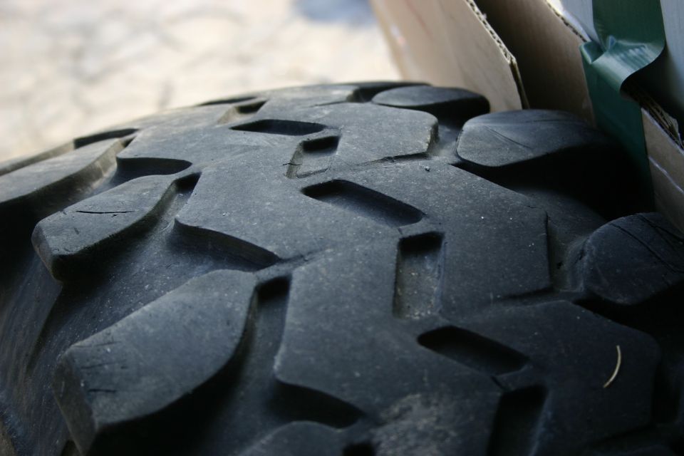Close-up of aggressive tire tread pattern