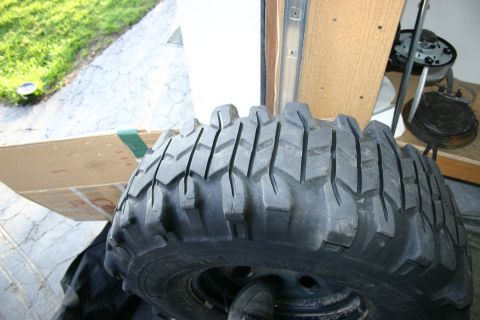 2003 Jeep TJ - Close-up of an off-road tire, likely for a Jeep or similar vehicle.