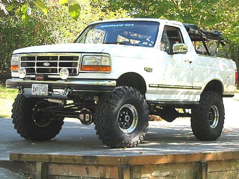 1995 Ford Bronco - This modified 1995 Ford Bronco features a lifted suspension and aggressive off-road tires, ready for any terrain.