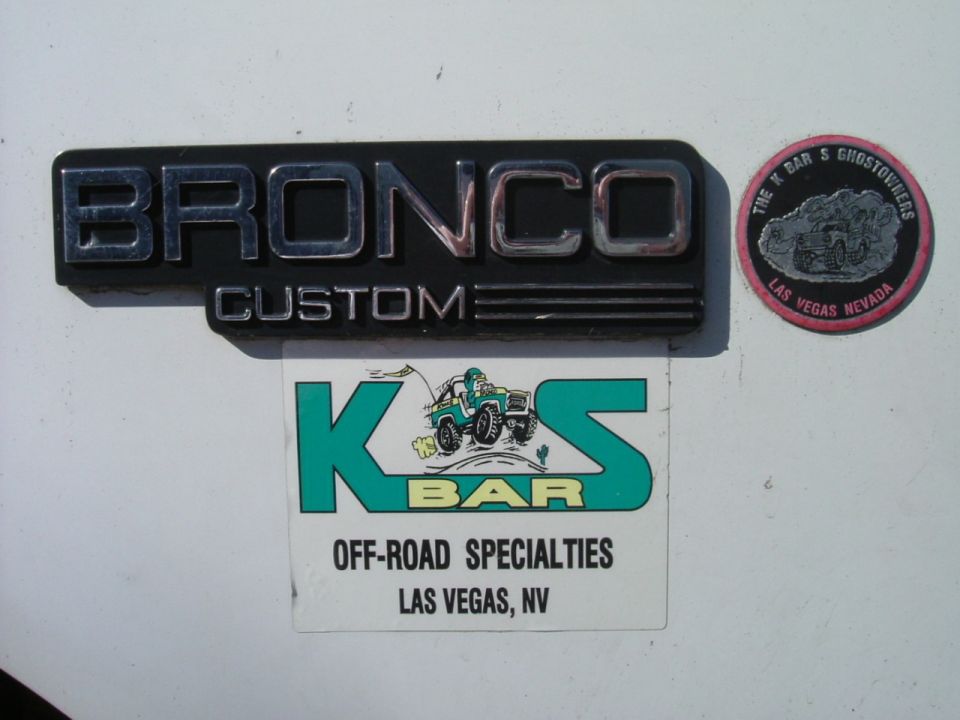White Bronco panel with BRONCO CUSTOM emblem and K&S off-road stickers