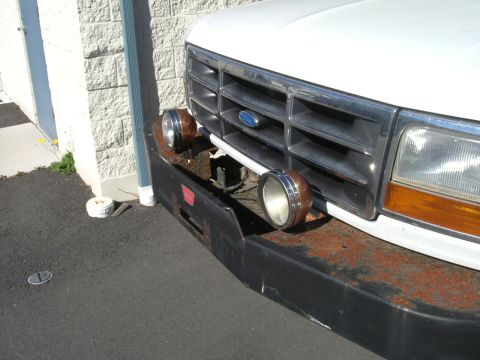 1993 Ford Bronco - The grille design and headlight shape suggest a 1992 Ford F-Series truck, not a 1993 Bronco.