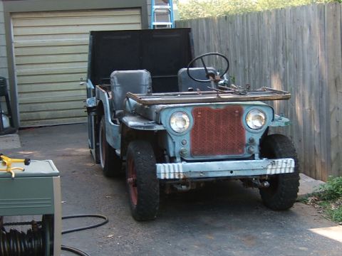 1950 Jeep CJ5 - This Jeep has a distinctive vertical slat grille, indicating it's likely a CJ-3B model.