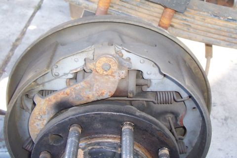1994 Ford F-150 - Rear drum brake assembly showing brake shoes, springs, and drum.
