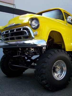 1995 Ford Bronco - Modified 1955 Chevrolet pickup truck with oversized tires and a lifted suspension.